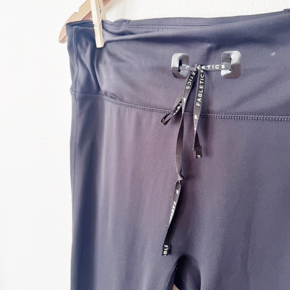 Fabletics Black Drawstring Athletic Leggings with white Trim - Picture 2 of 3